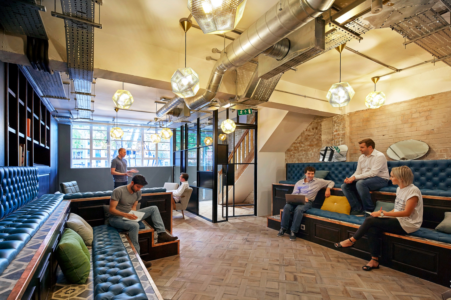 People working together in office breakout area