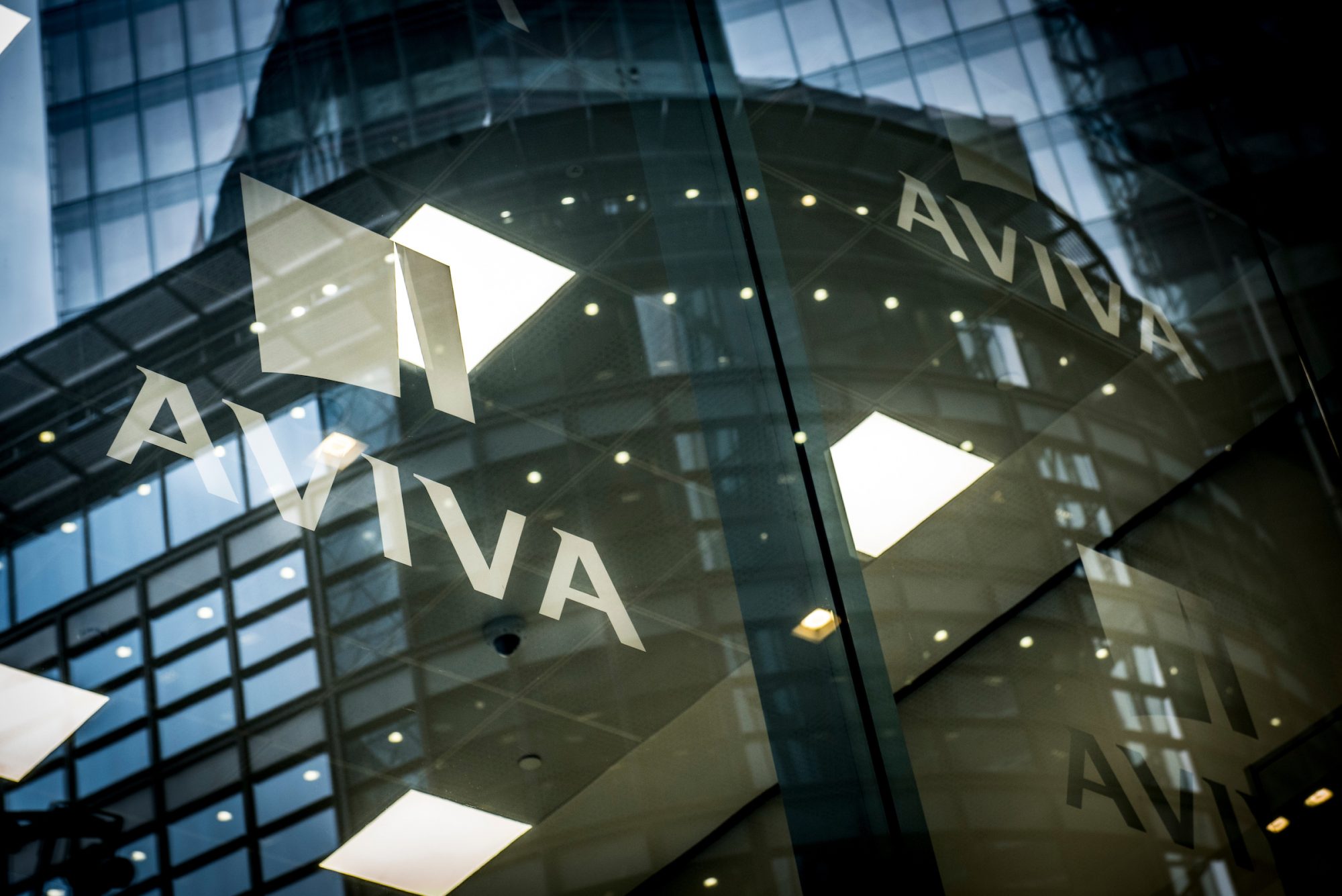 Reflection of Aviva logo in glass buildings