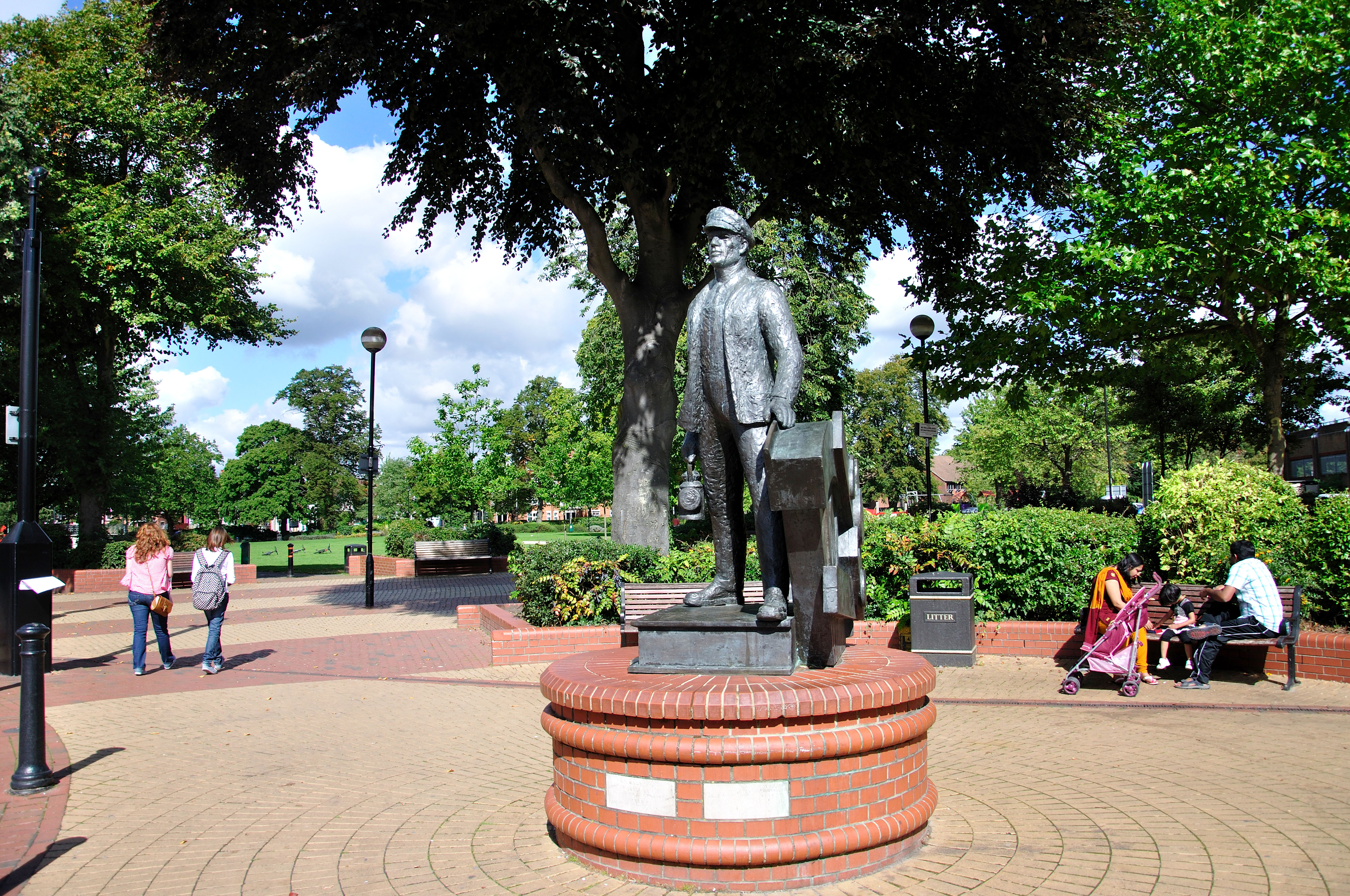 Image of a statue of a man in a town square
